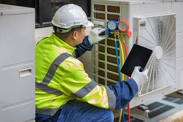 Professional Hvac technician working in Decatur, AL